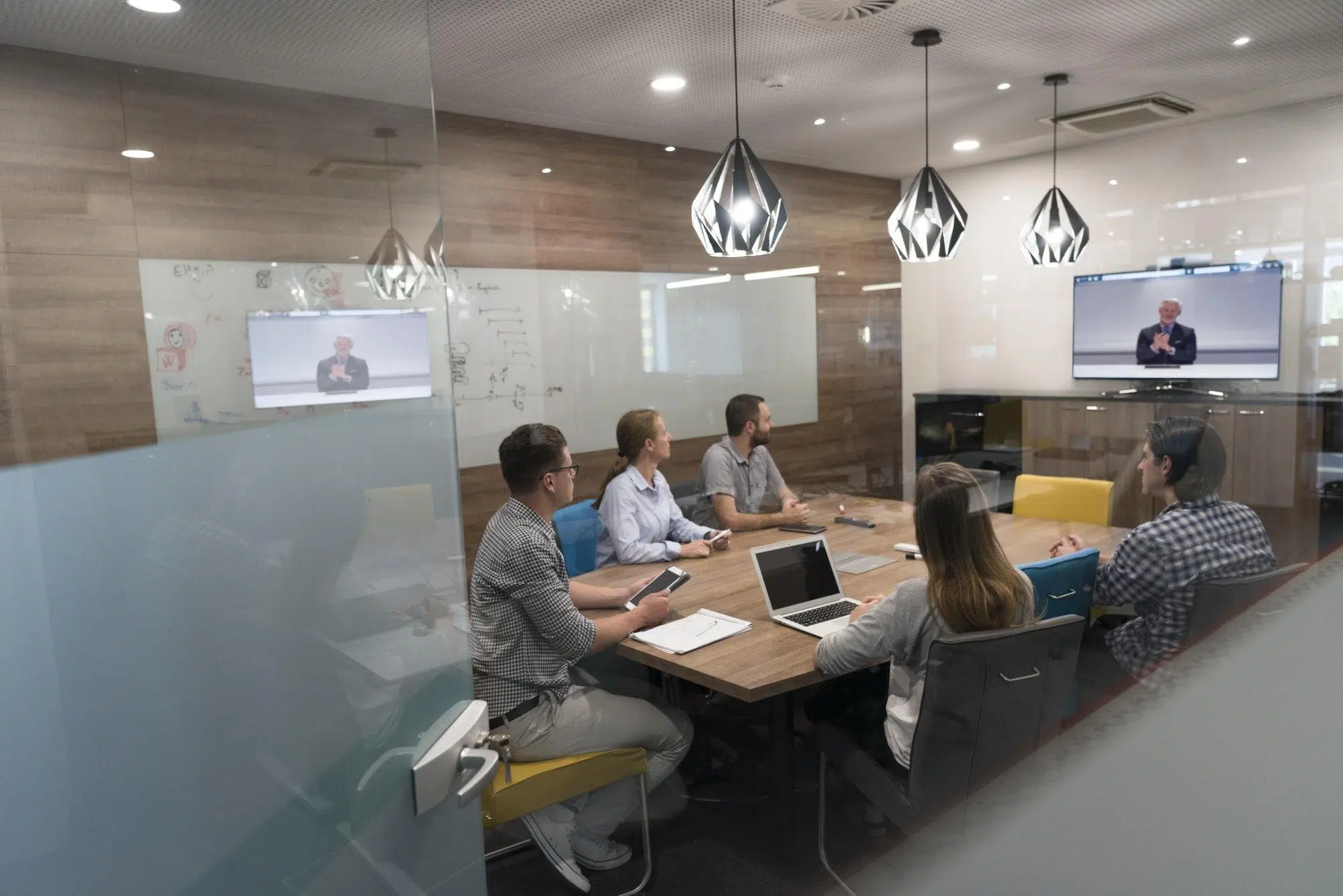 start up business people group attending videoconference call